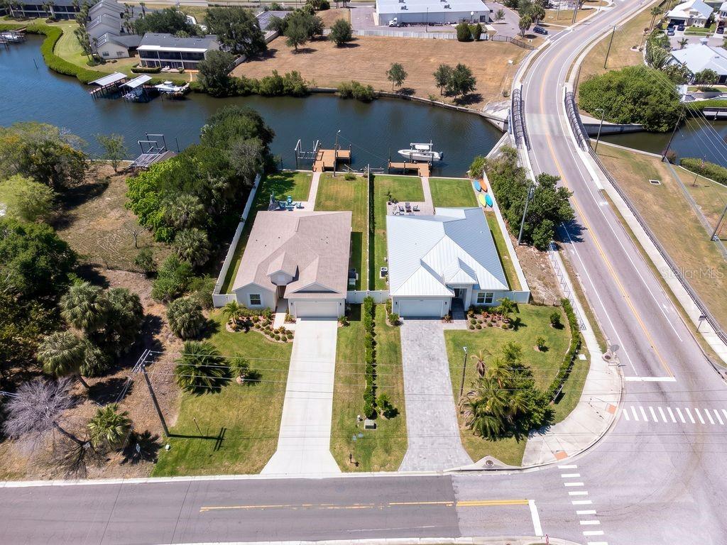 601 Flamingo Drive Apollo Beach, FL 33572 - Photo 5 of 15 an aerial view of a house with a garden and plants