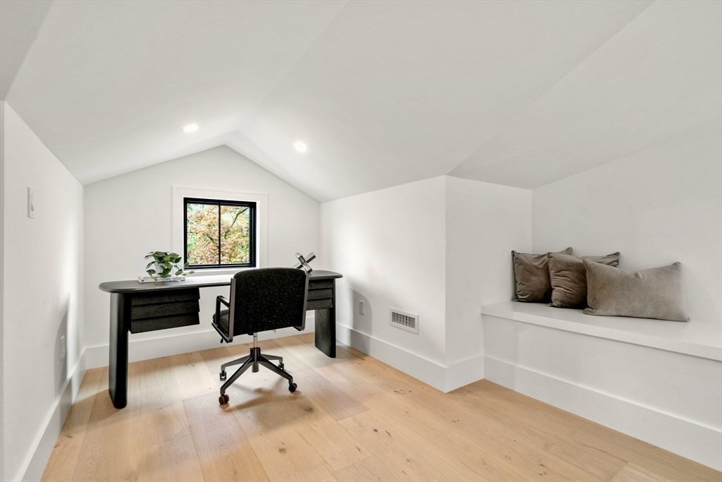 71 Cloverdale Road, Unit 1 Newton, MA 02461 - Photo 17 of 32 a view of a livingroom with furniture and a window