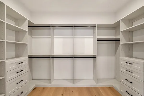 a view of an empty walk in closet