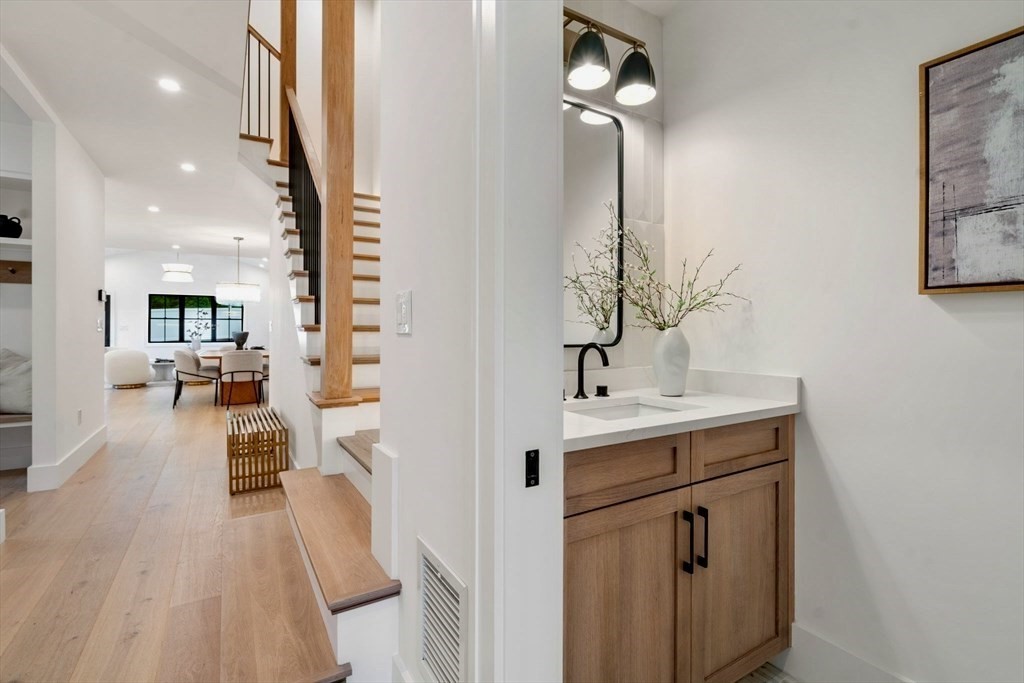 71 Cloverdale Road, Unit 1 Newton, MA 02461 - Photo 5 of 32 a view of living room with furniture and wooden floor