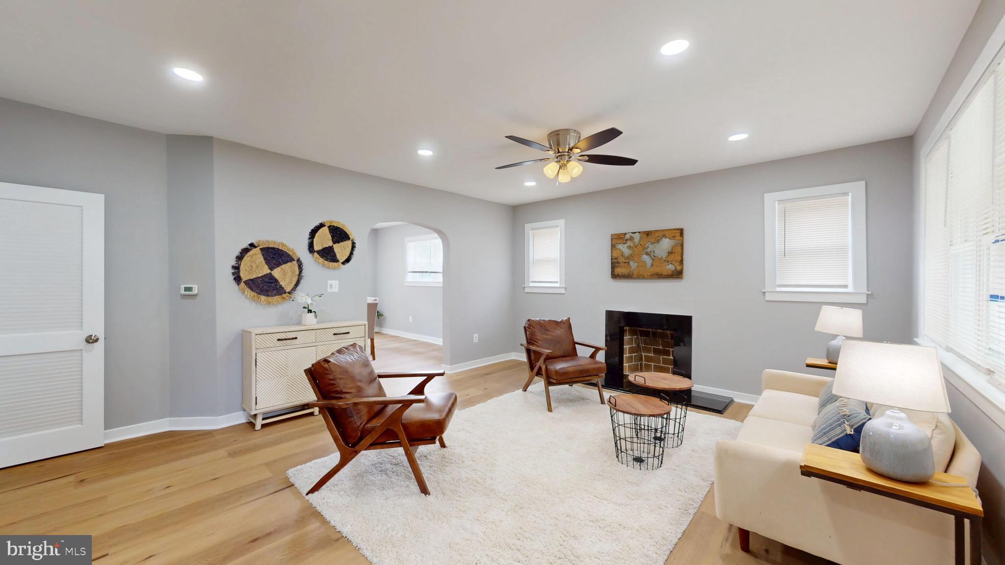 3301 Cedarhurst Road Baltimore, MD 21214 - Photo 2 of 25 Sun Drenched Living Room w/ Fireplace