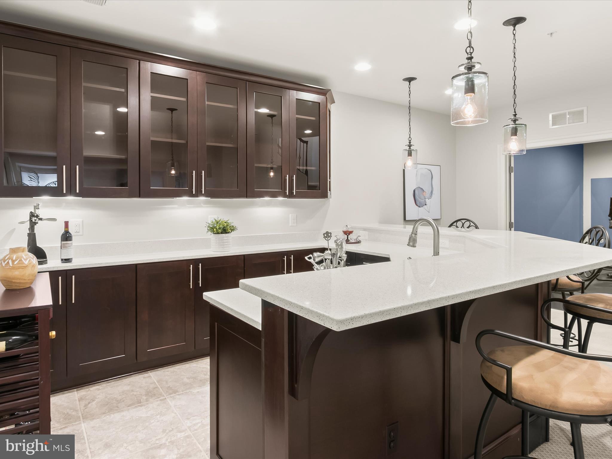 7775 Elmwood Road Fulton, MD 20759 - Photo 66 of 86 a kitchen with a sink cabinets and wooden floor