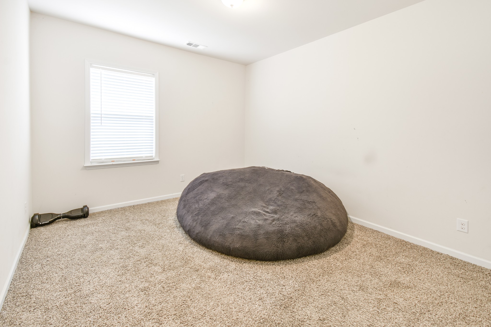 1407 Old Stone Road Lebanon, TN 37087 - Photo 17 of 45 an empty room with a window