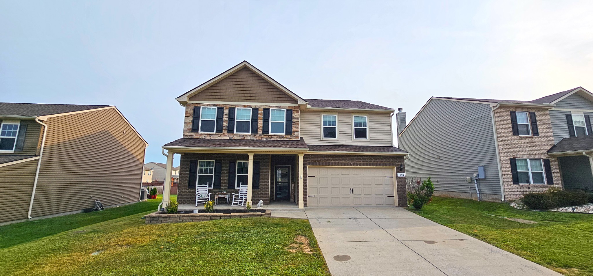 1407 Old Stone Road Lebanon, TN 37087 - Photo 2 of 45 a front view of a house with a yard