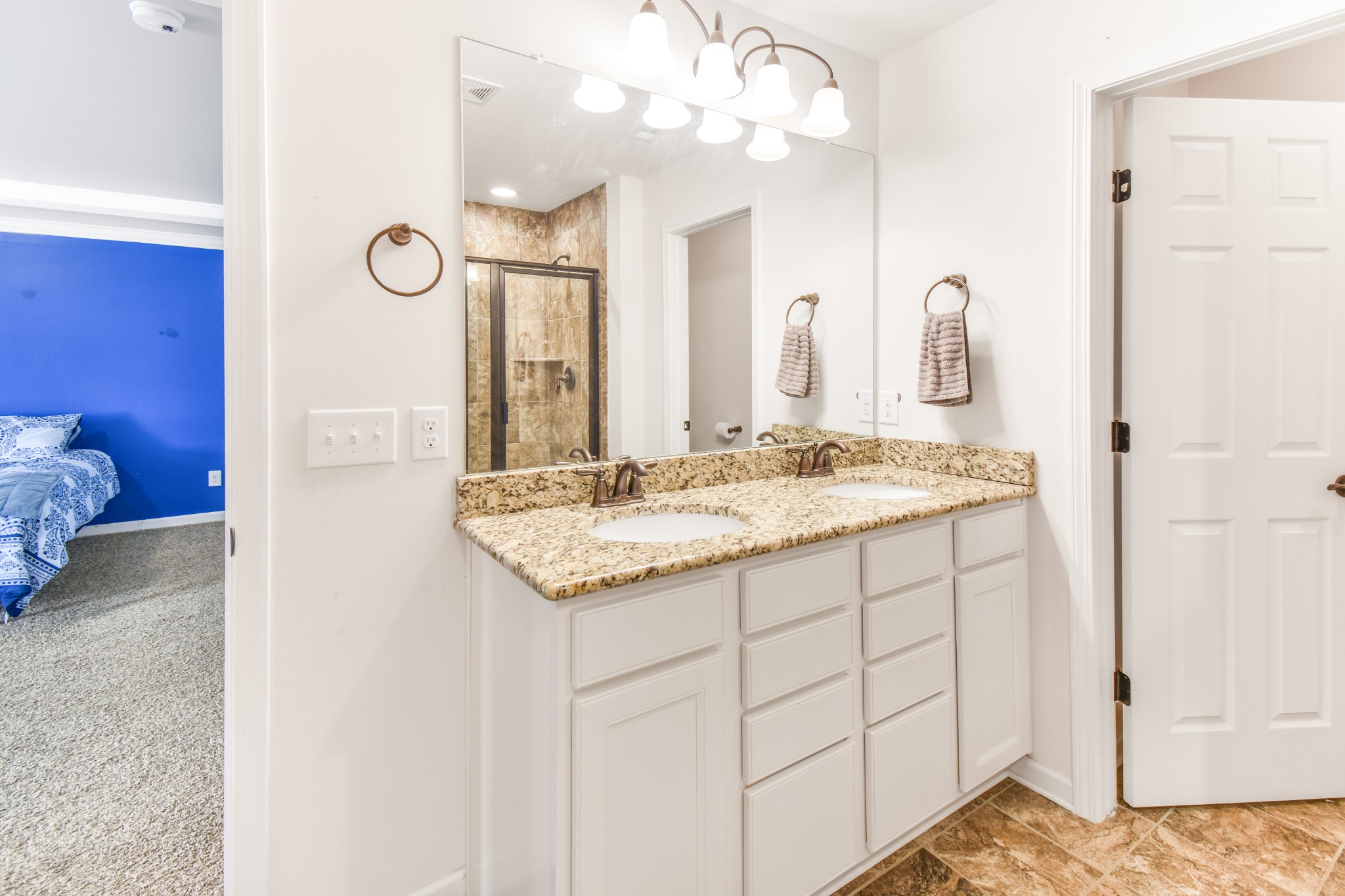 1407 Old Stone Road Lebanon, TN 37087 - Photo 26 of 45 a bathroom with a sink vanity and a mirror