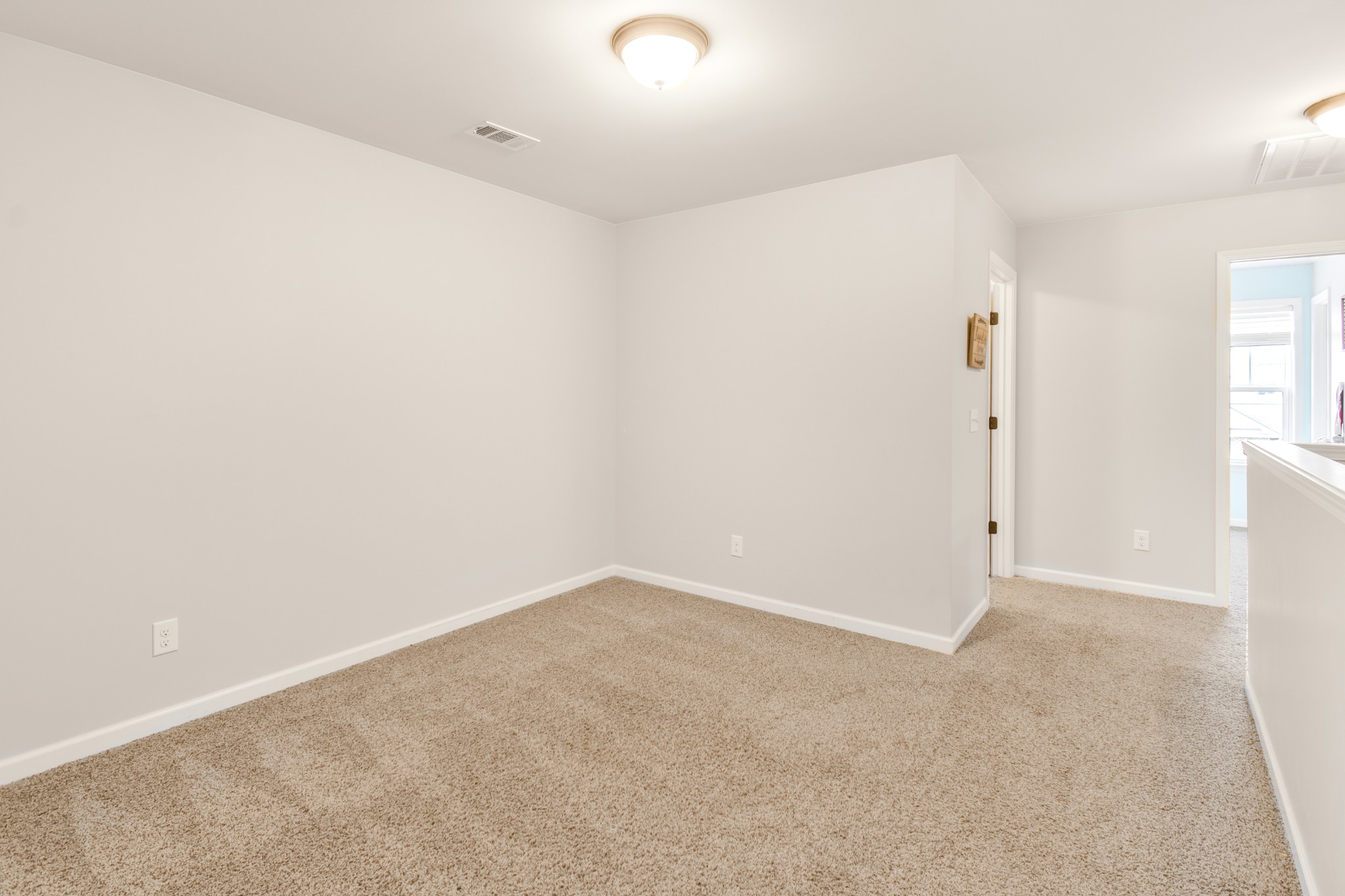 1407 Old Stone Road Lebanon, TN 37087 - Photo 33 of 45 an empty room with windows