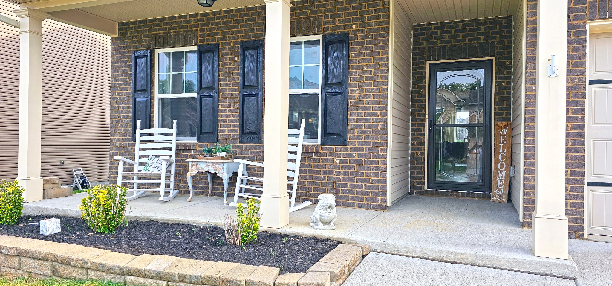 1407 Old Stone Road Lebanon, TN 37087 - Photo 4 of 45 a view of front door of house with outdoor seating