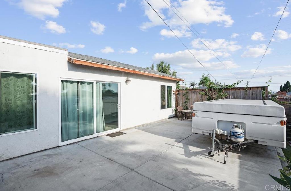 3964 Delta Street San Diego, CA 92113 - Photo 29 of 42 a roof deck with table and chairs and potted plants