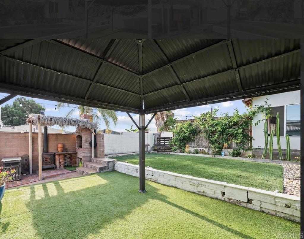 3964 Delta Street San Diego, CA 92113 - Photo 40 of 42 a view of a backyard with swimming pool