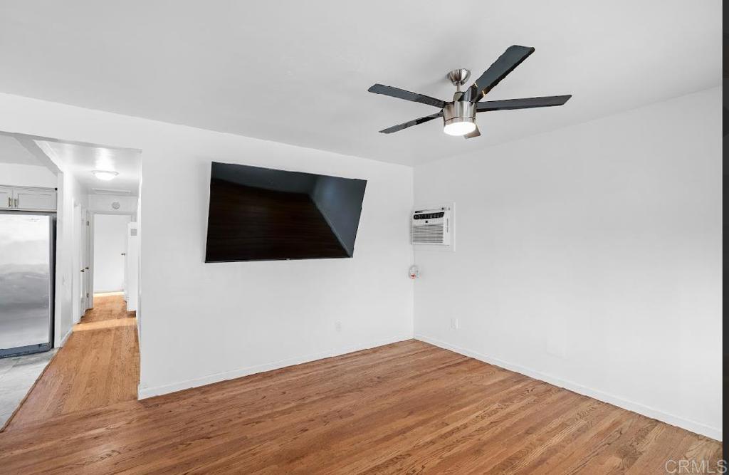 3964 Delta Street San Diego, CA 92113 - Photo 10 of 42 a view of a livingroom with wooden floor