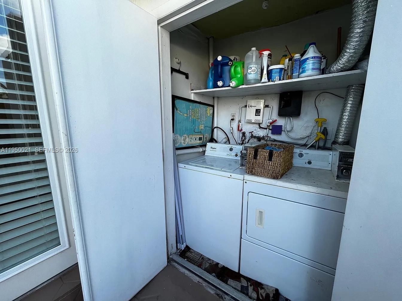2049 Southwest 60th Court, Unit 1 Miami, FL 33155 - Photo 13 of 16 a room with storage and utility