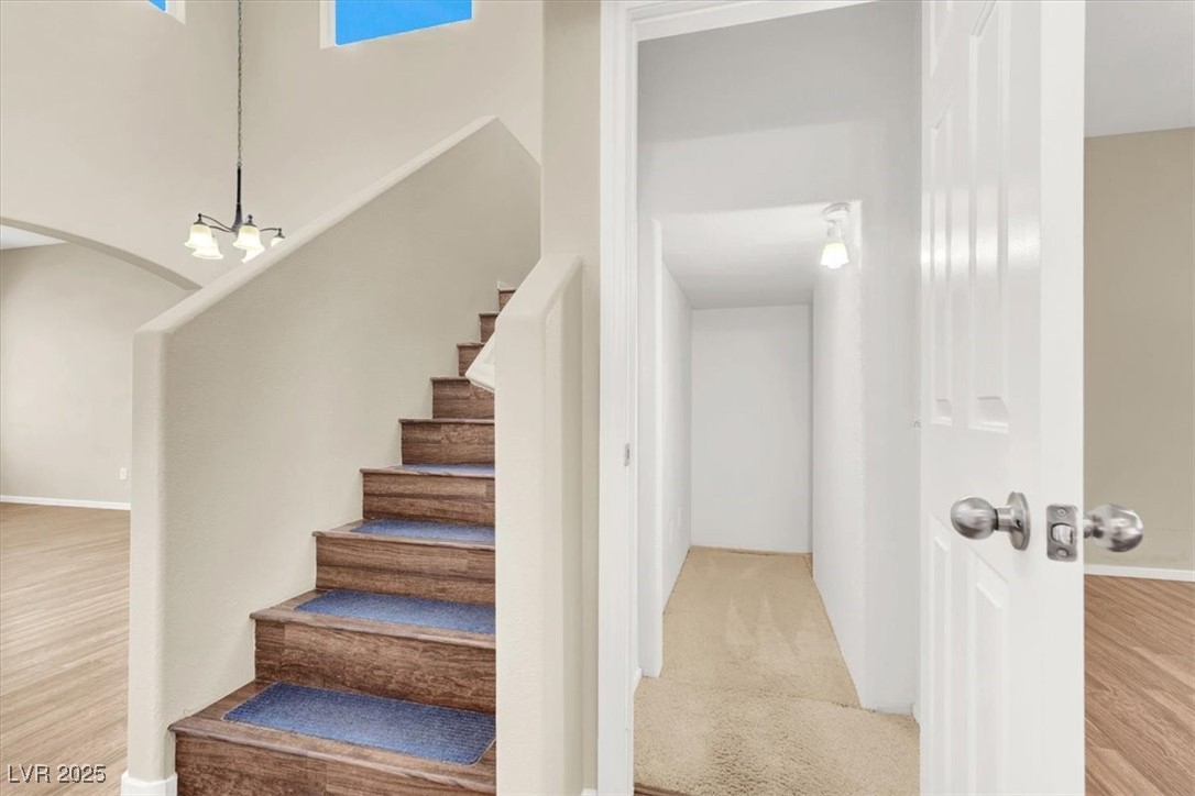 636 Pacific Cascades Drive Henderson, NV 89012 - Photo 25 of 51 Staircase with wood finished floors and baseboards