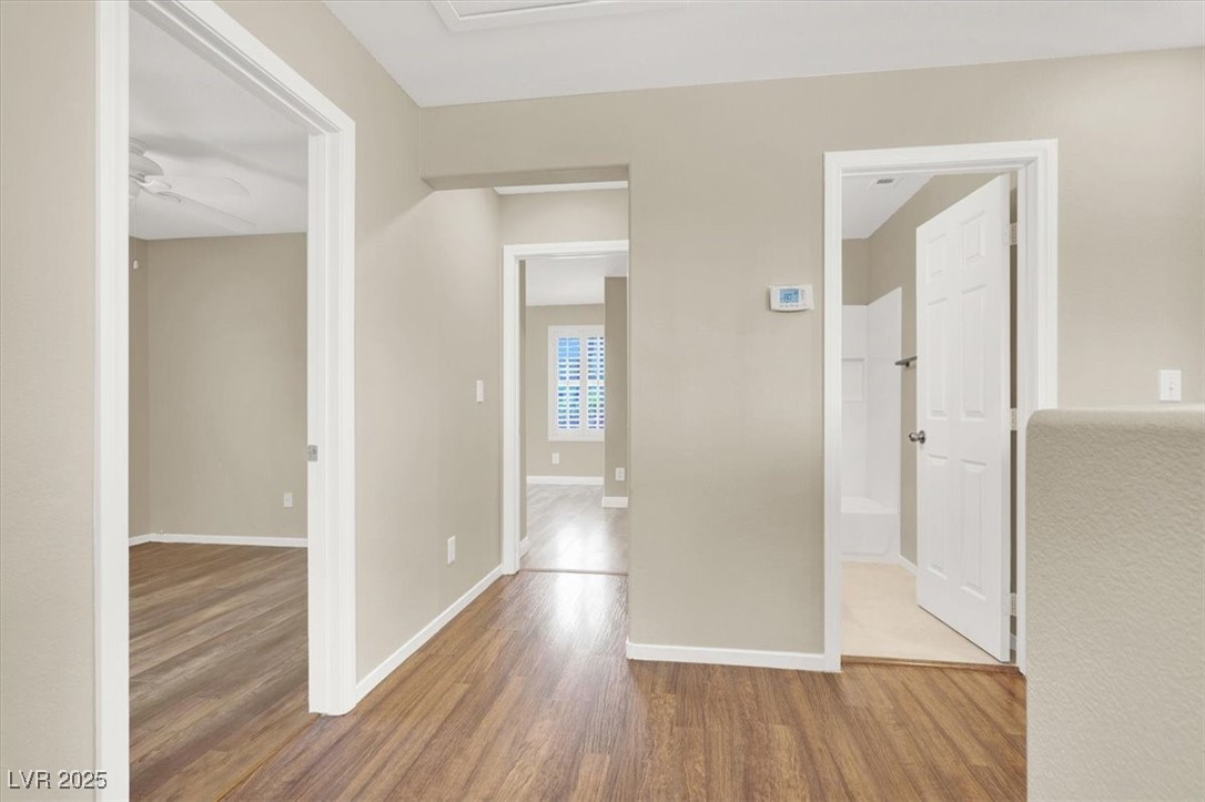 636 Pacific Cascades Drive Henderson, NV 89012 - Photo 26 of 51 Hall featuring wood finished floors and baseboards