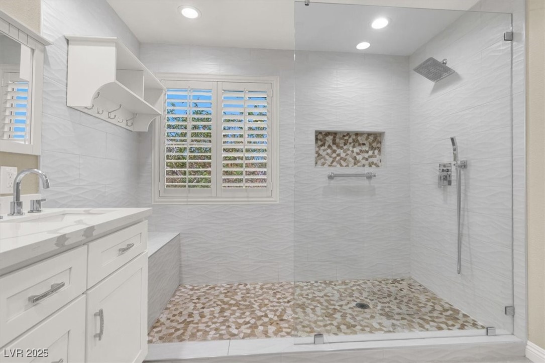 636 Pacific Cascades Drive Henderson, NV 89012 - Photo 31 of 51 Full bathroom featuring vanity, a walk in shower, and recessed lighting