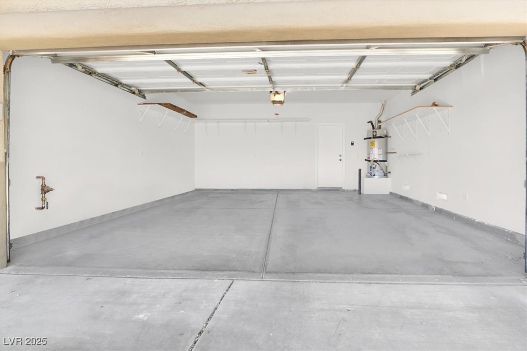 636 Pacific Cascades Drive Henderson, NV 89012 - Photo 38 of 51 Garage with secured water heater