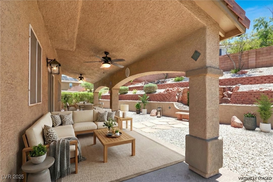 636 Pacific Cascades Drive Henderson, NV 89012 - Photo 39 of 51 View of patio with an outdoor hangout area and a ceiling fan