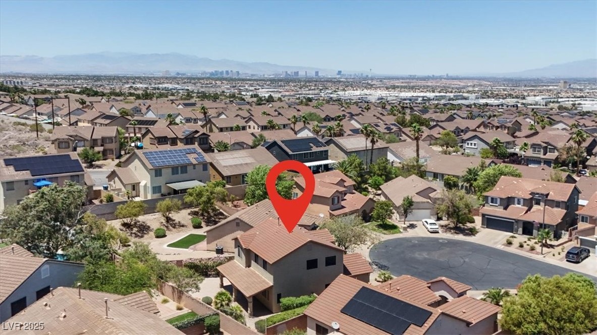 636 Pacific Cascades Drive Henderson, NV 89012 - Photo 44 of 51 Aerial perspective of suburban area with a mountainous background