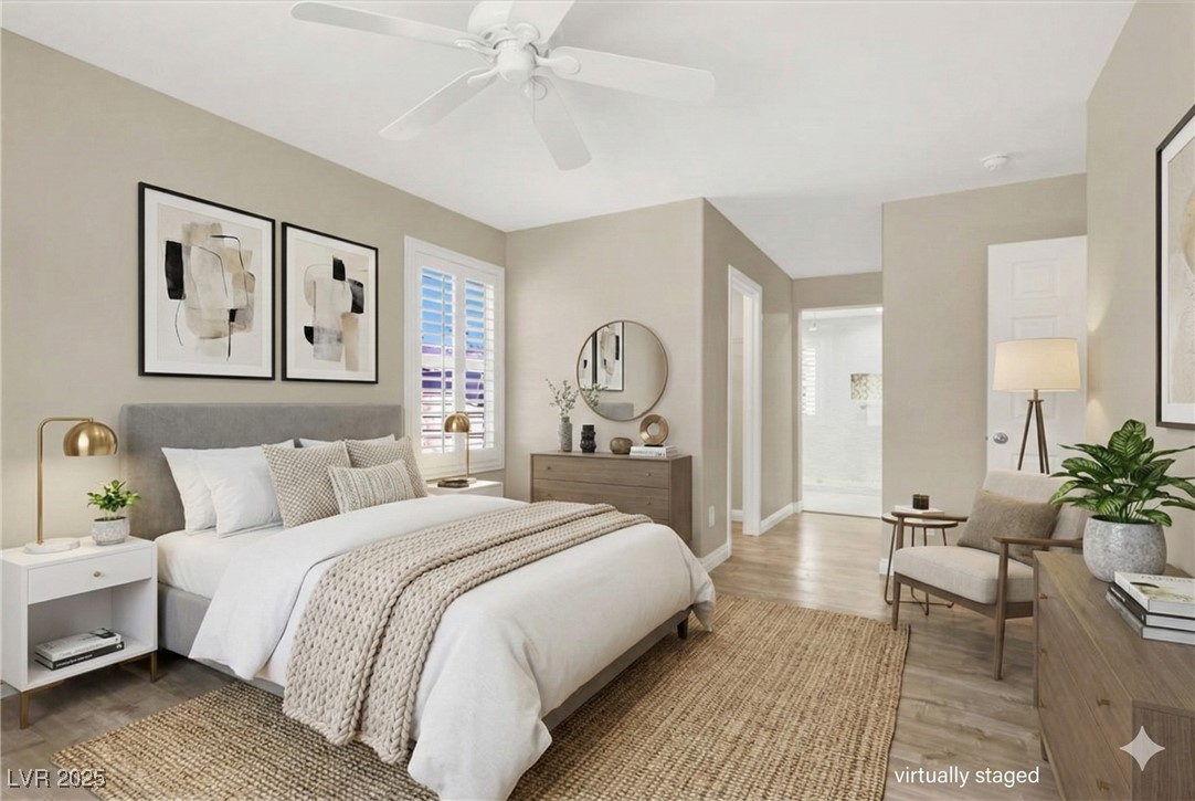 636 Pacific Cascades Drive Henderson, NV 89012 - Photo 5 of 51 Bedroom featuring wood finished floors and ceiling fan