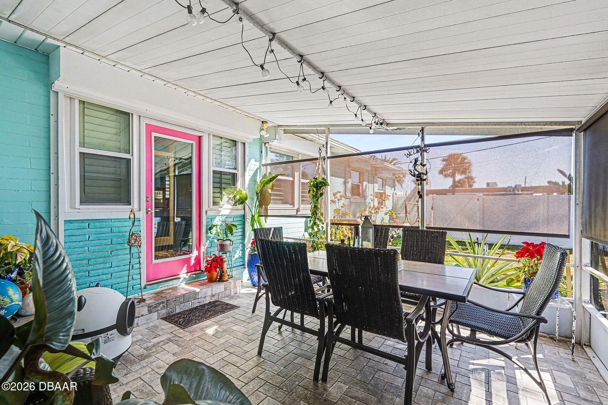 302 Riverside Drive Holly Hill, FL 32117 - Photo 18 of 23 a view of an outdoor dining space with a patio