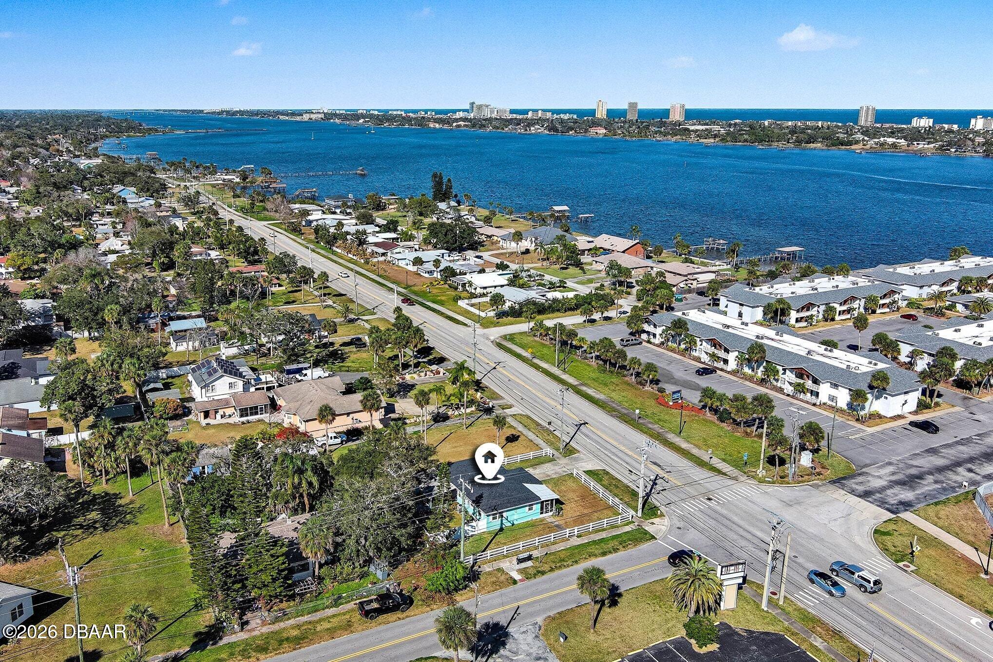 302 Riverside Drive Holly Hill, FL 32117 - Photo 3 of 23 an aerial view of a city