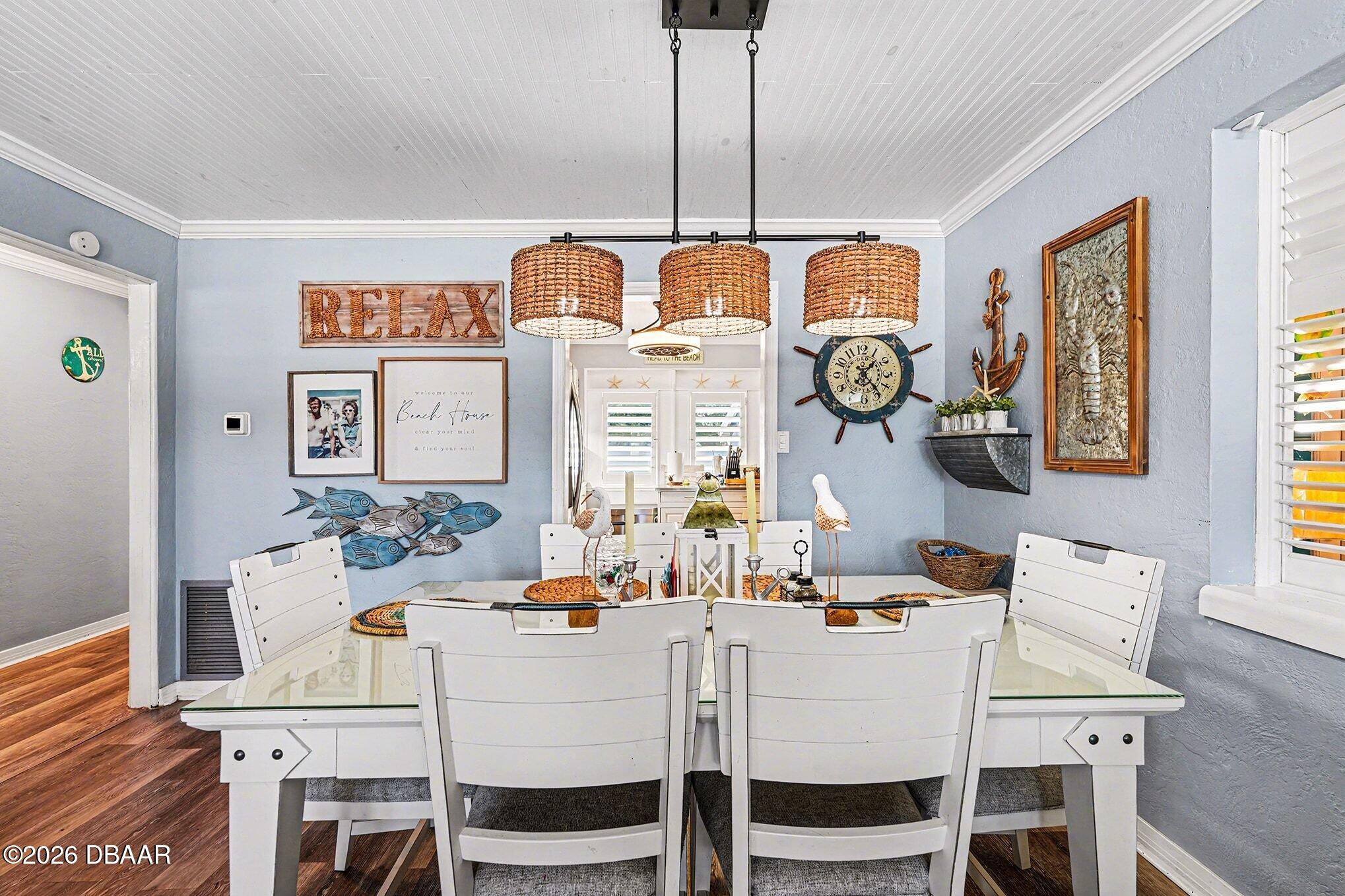 302 Riverside Drive Holly Hill, FL 32117 - Photo 7 of 23 a dining room with furniture and window