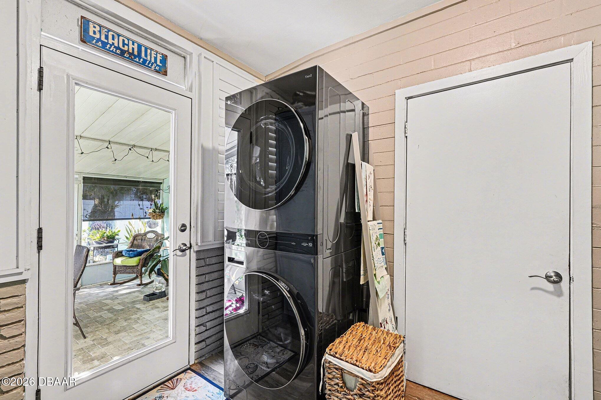 302 Riverside Drive Holly Hill, FL 32117 - Photo 10 of 23 a bathroom with a toilet a sink and a mirror