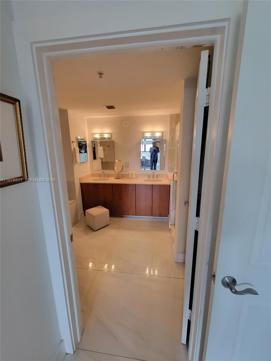 888 Douglas Road, Unit 1110 Coral Gables, FL 33134 - Photo 14 of 28 a view of a living room