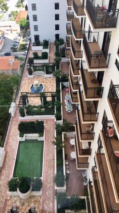 888 Douglas Road, Unit 1110 Coral Gables, FL 33134 - Photo 26 of 28 an aerial view of a residential apartment building with a yard