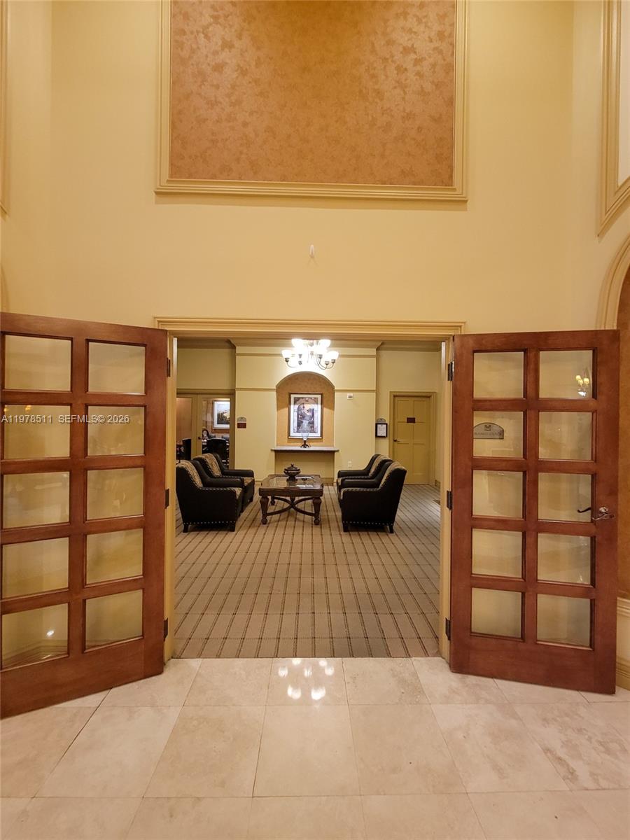 888 Douglas Road, Unit 1110 Coral Gables, FL 33134 - Photo 27 of 28 a view of a livingroom with furniture and the couch