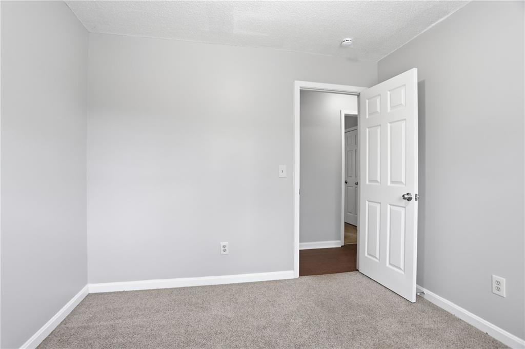 113 Hampton Drive Dallas, GA 30132 - Photo 14 of 30 a view of an empty room