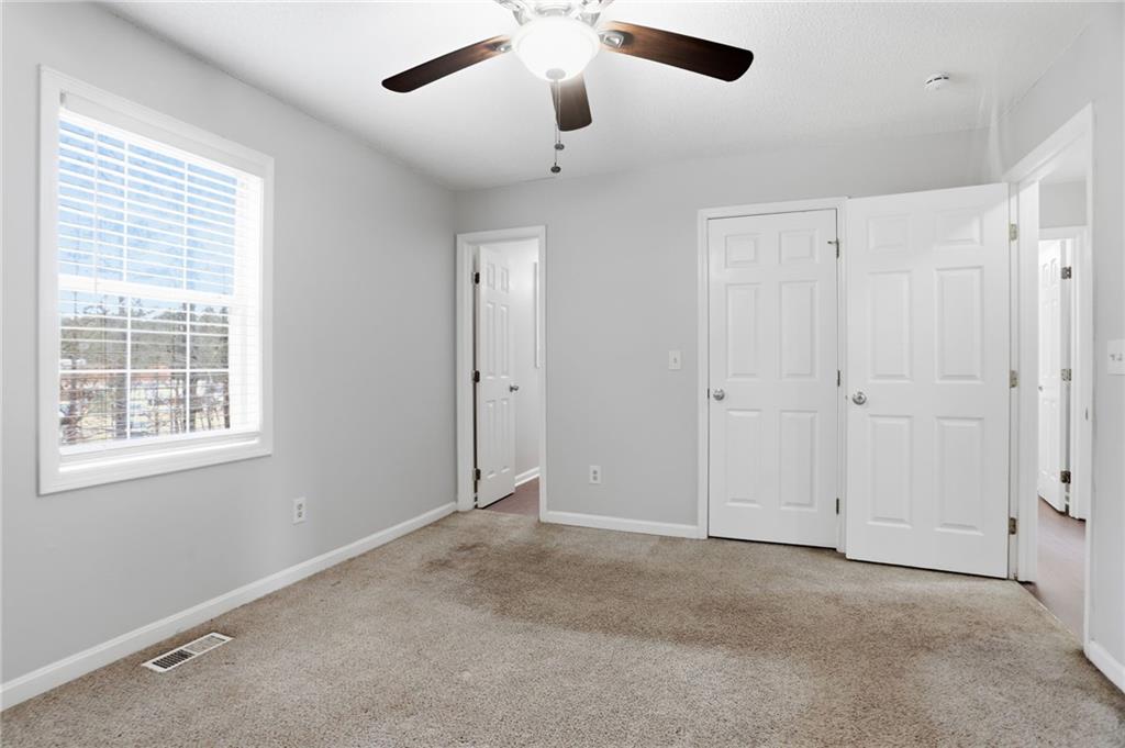 113 Hampton Drive Dallas, GA 30132 - Photo 21 of 30 a view of an empty room with a window