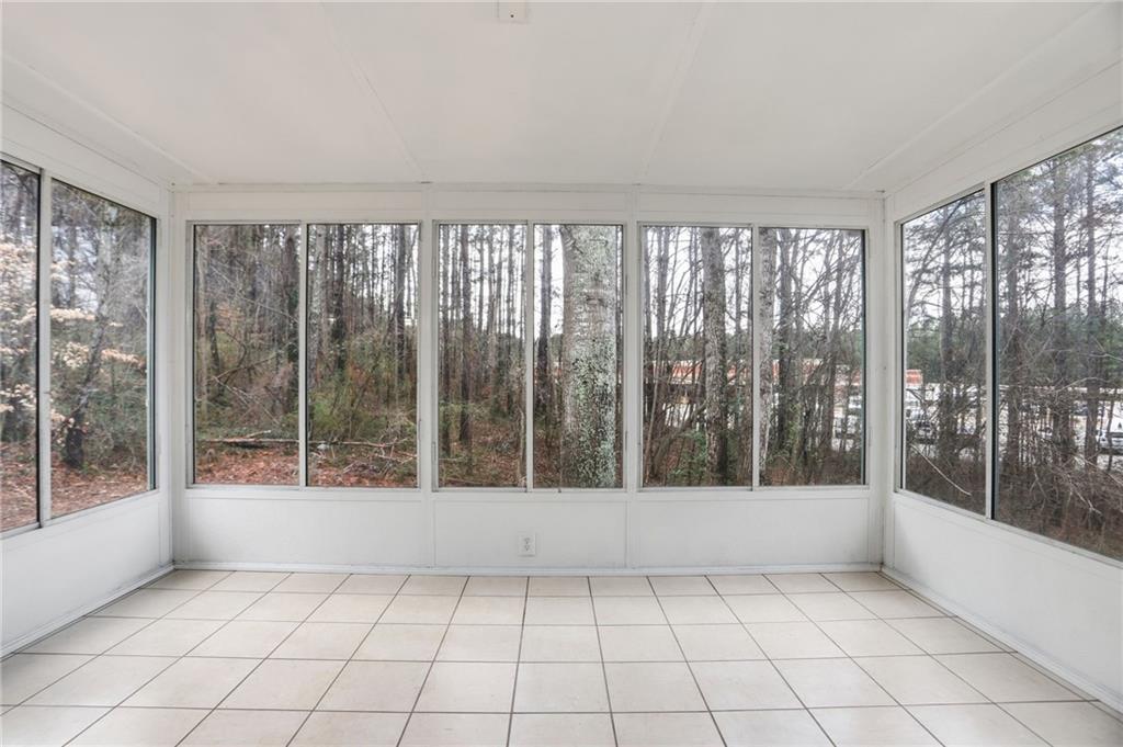 113 Hampton Drive Dallas, GA 30132 - Photo 22 of 30 a view of wooden floor and brick walls