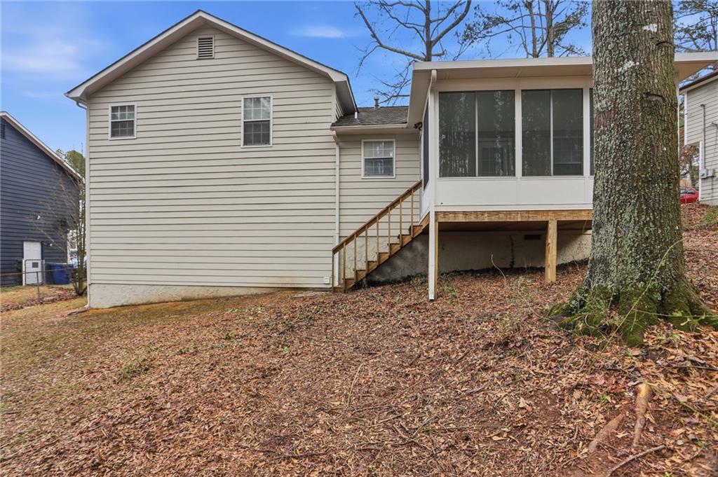 113 Hampton Drive Dallas, GA 30132 - Photo 25 of 30 a view of a house with a yard