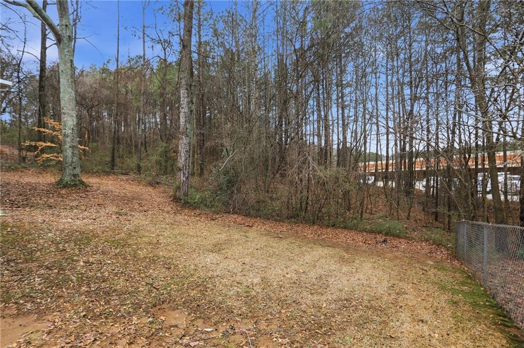 113 Hampton Drive Dallas, GA 30132 - Photo 27 of 30 a view of a yard with trees