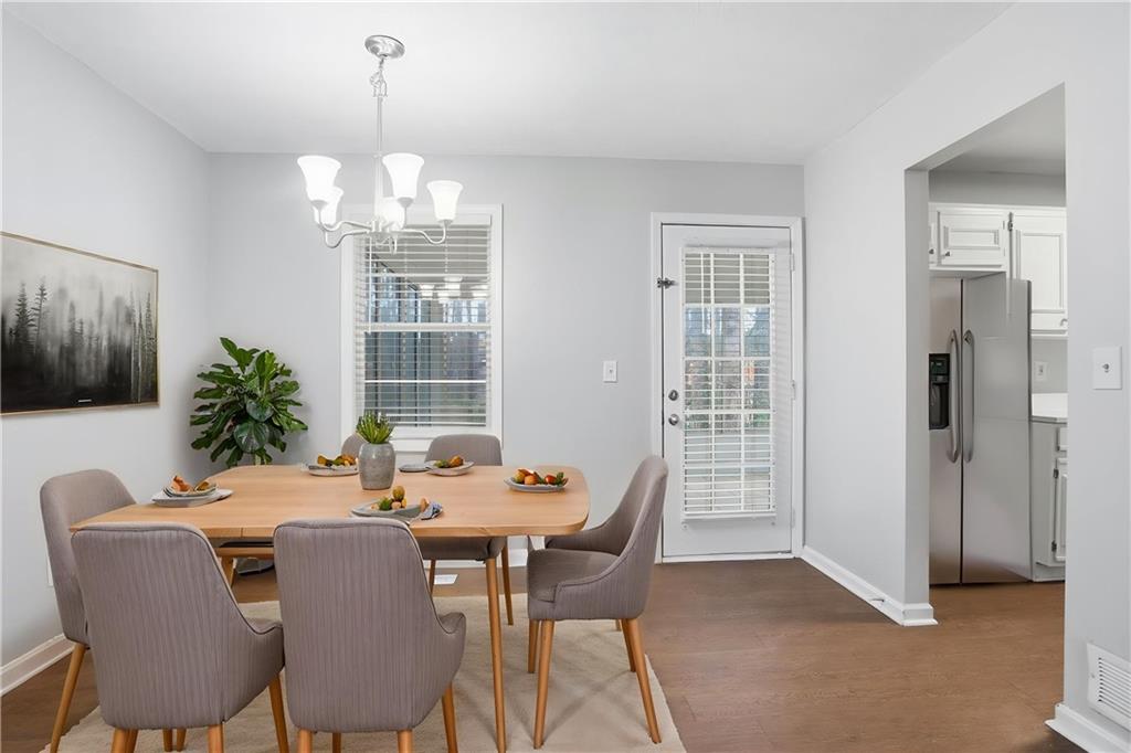 113 Hampton Drive Dallas, GA 30132 - Photo 4 of 30 a view of a dining room with furniture window and outside view