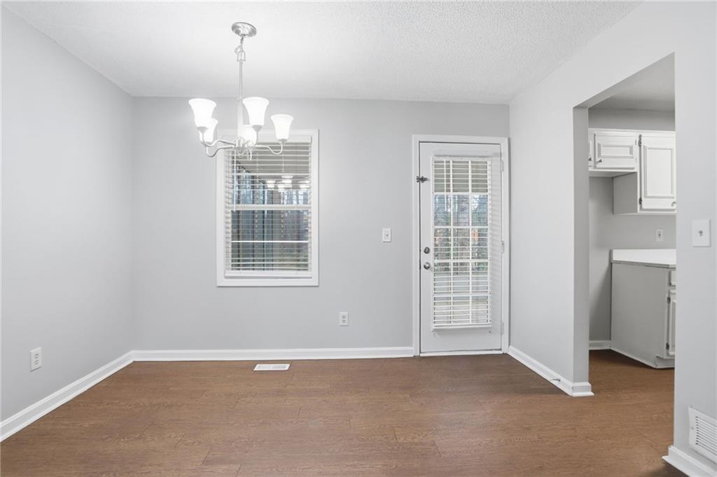 113 Hampton Drive Dallas, GA 30132 - Photo 10 of 30 a view of an empty room with a window