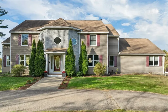front view of house with a yard
