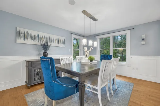 a view of a livingroom with furniture and window