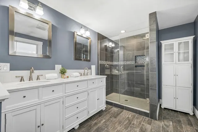 a spacious bedroom with a bed and a window