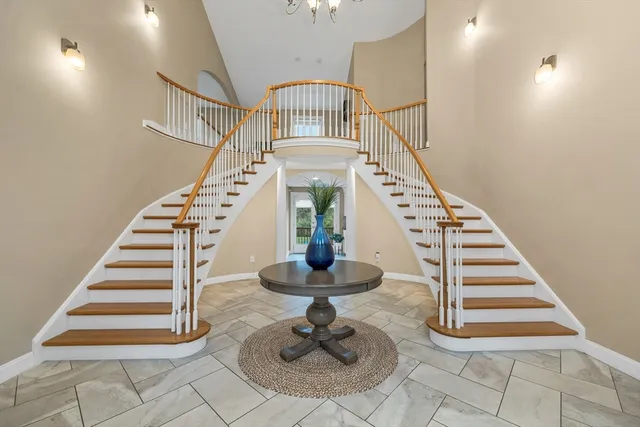 a view of entryway and hall with a window
