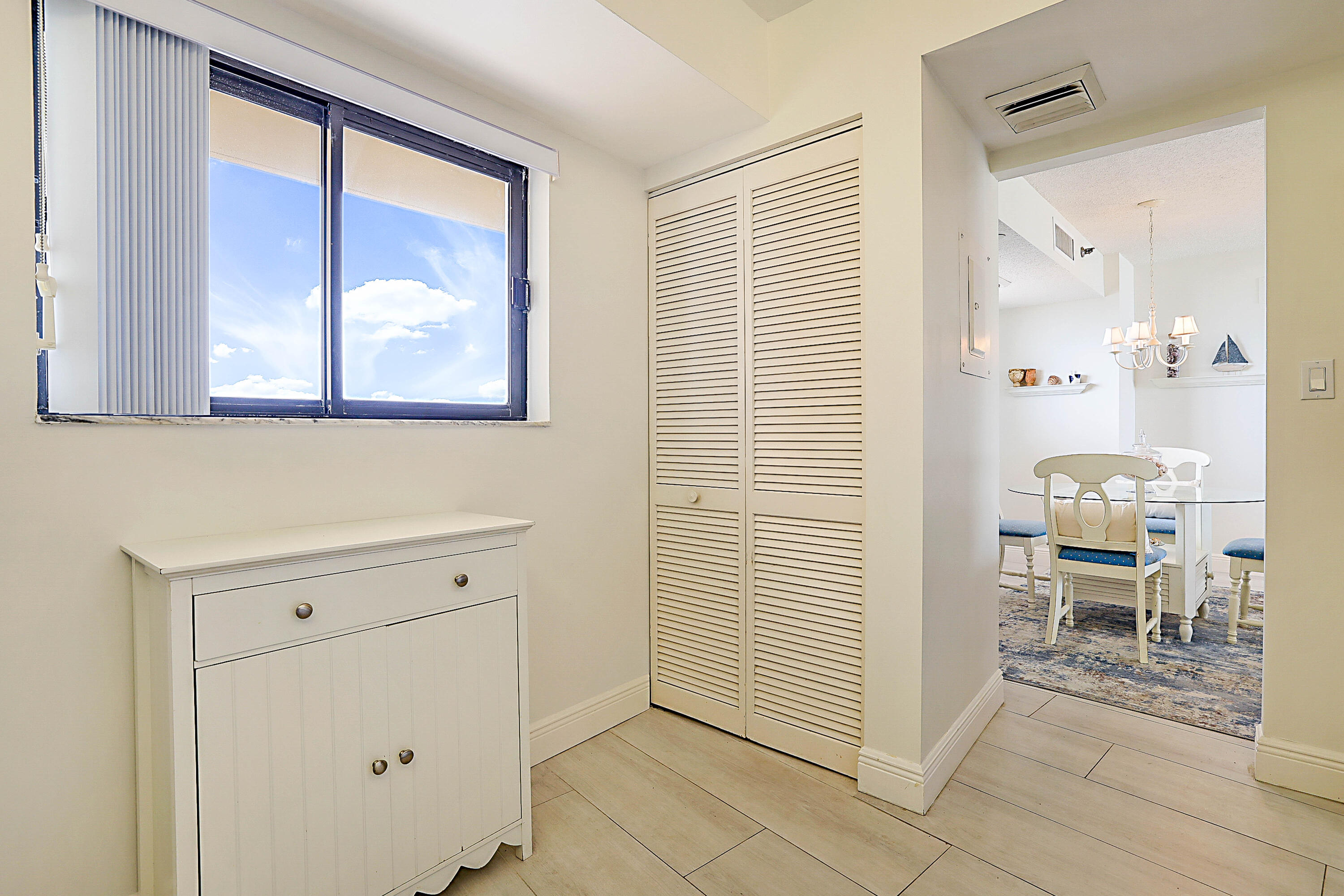 100 Ocean Trail Way, Unit 1003 Jupiter, FL 33477 - Photo 15 of 33 a view of kitchen with furniture and windows