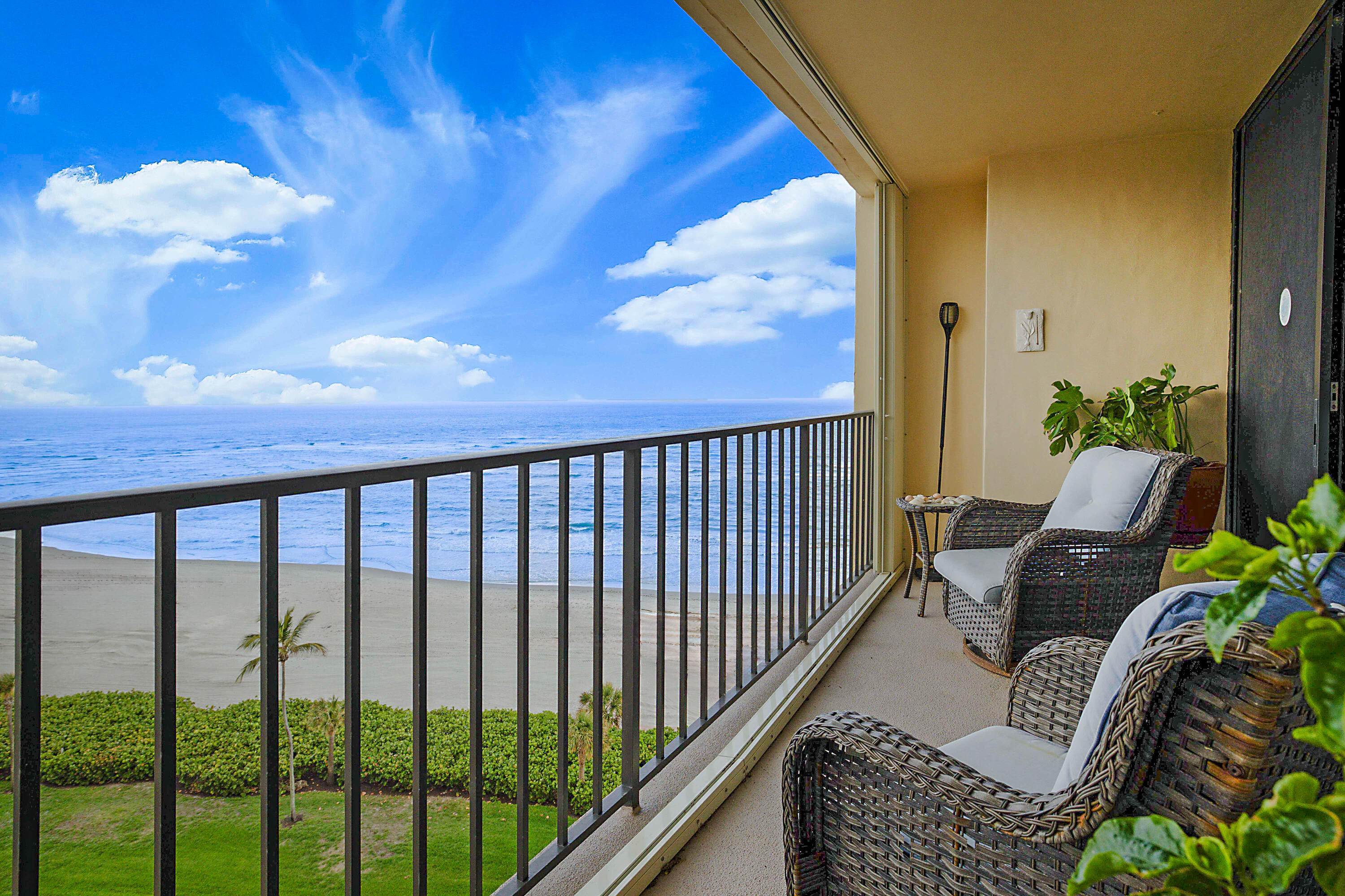 100 Ocean Trail Way, Unit 1003 Jupiter, FL 33477 - Photo 28 of 33 a balcony with furniture
