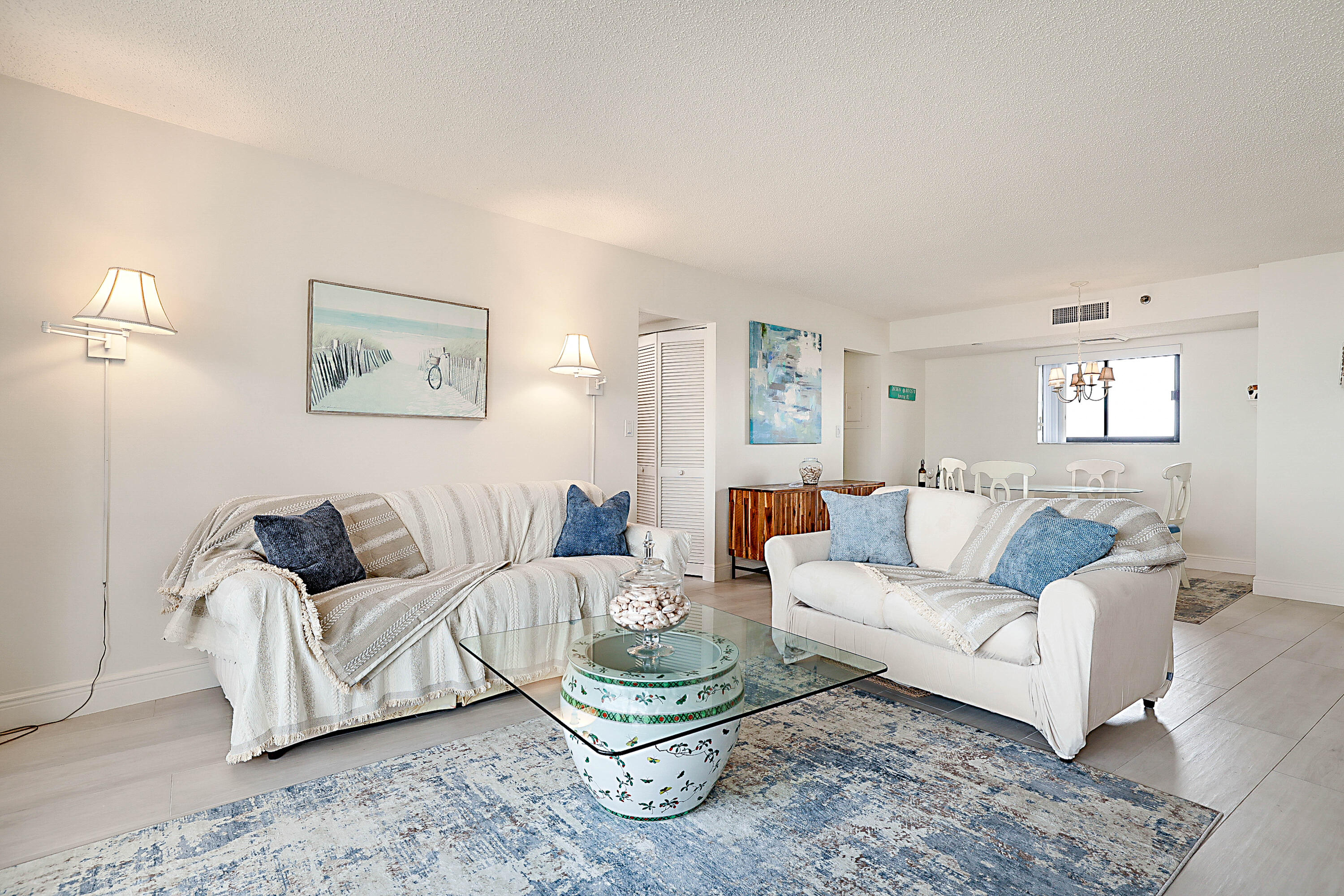100 Ocean Trail Way, Unit 1003 Jupiter, FL 33477 - Photo 4 of 33 a living room with furniture and a couch