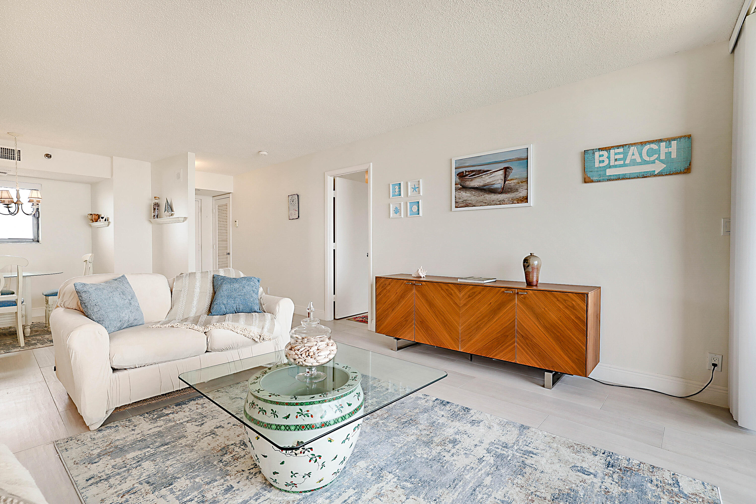 100 Ocean Trail Way, Unit 1003 Jupiter, FL 33477 - Photo 5 of 33 a living room with furniture and a couch