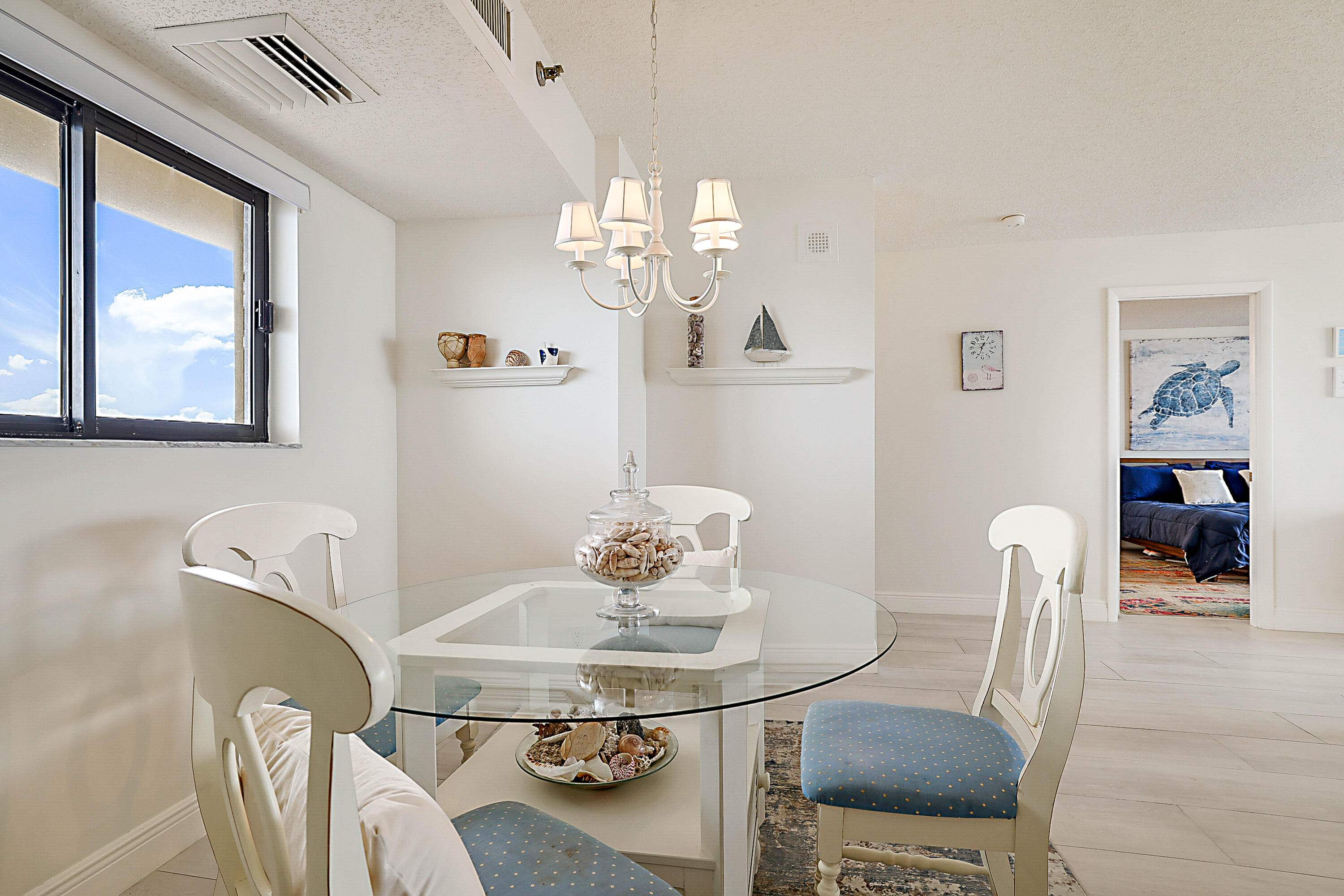 100 Ocean Trail Way, Unit 1003 Jupiter, FL 33477 - Photo 10 of 33 a view of a dining room with furniture