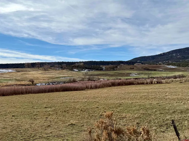 a view of lake with mountain