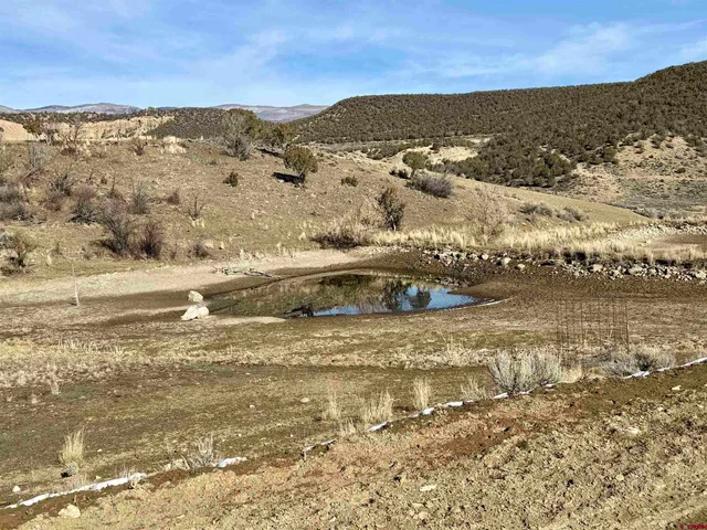 a view of lake and mountain
