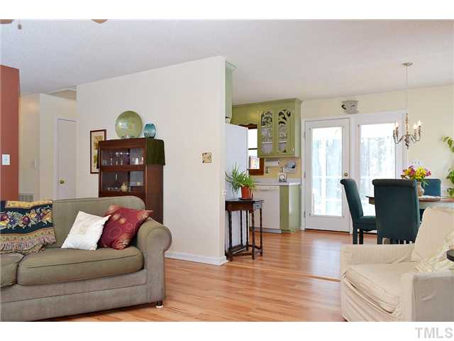3325 Castlegate Drive Raleigh, NC 27616 - Photo 25 of 25 a living room with furniture and wooden floor