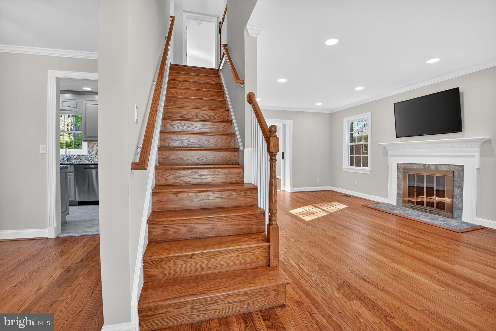 302 Penwood Road Silver Spring, MD 20901 - Photo 22 of 44 a view of entryway and hall with wooden floor