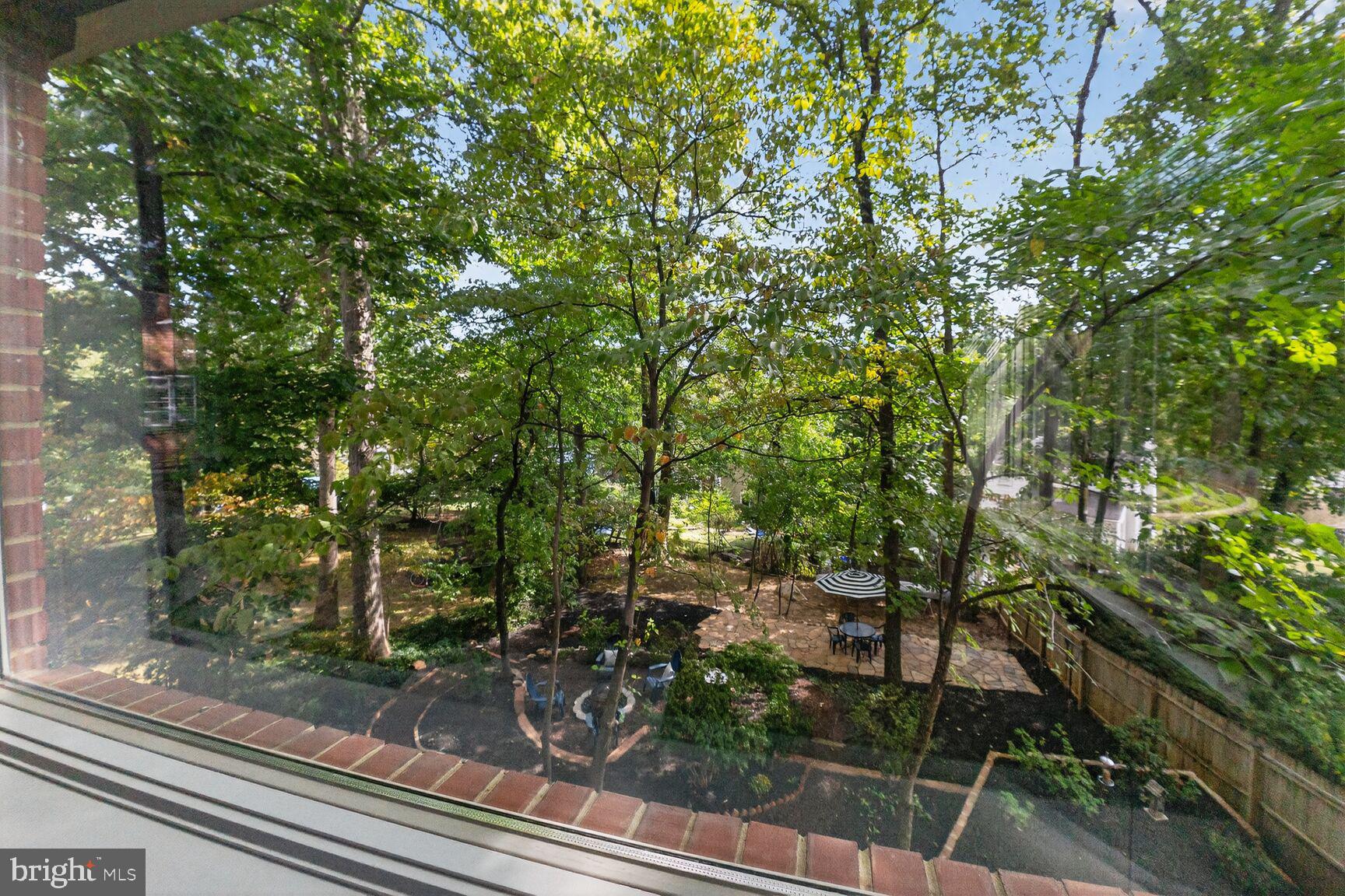 302 Penwood Road Silver Spring, MD 20901 - Photo 40 of 44 a view of a yard from a window